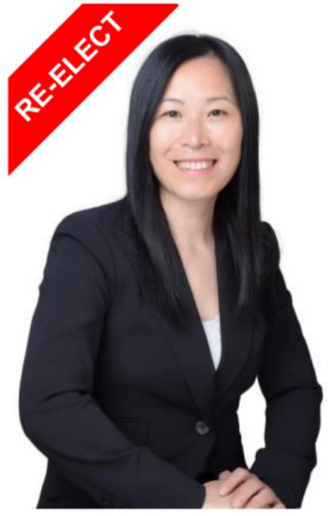 Cindy Liang, with a re-elect banner